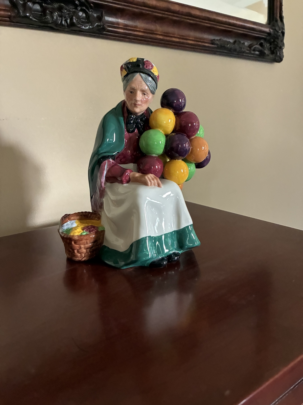 Royal Doulton Figurine 'The Old Balloon Seller' with Green and Brown Accents